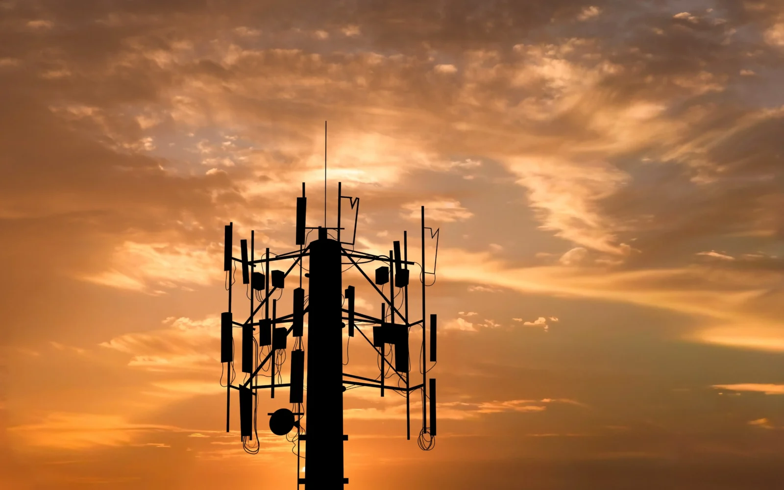 Cellular network tower supporting NB-IoT, LTE-M, and Cat-1 bis IoT connectivity