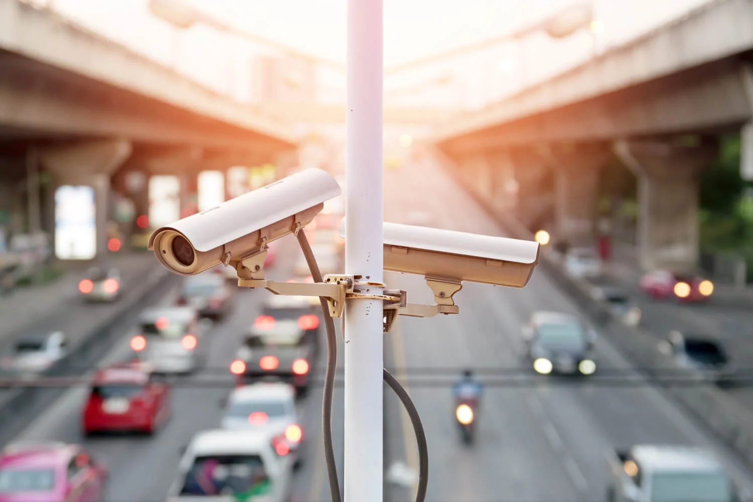 Smart CCTV cameras mounted on pole monitoring urban traffic for 5G IoT surveillance
